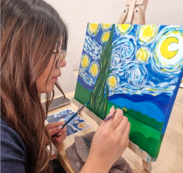 Photo of me painting